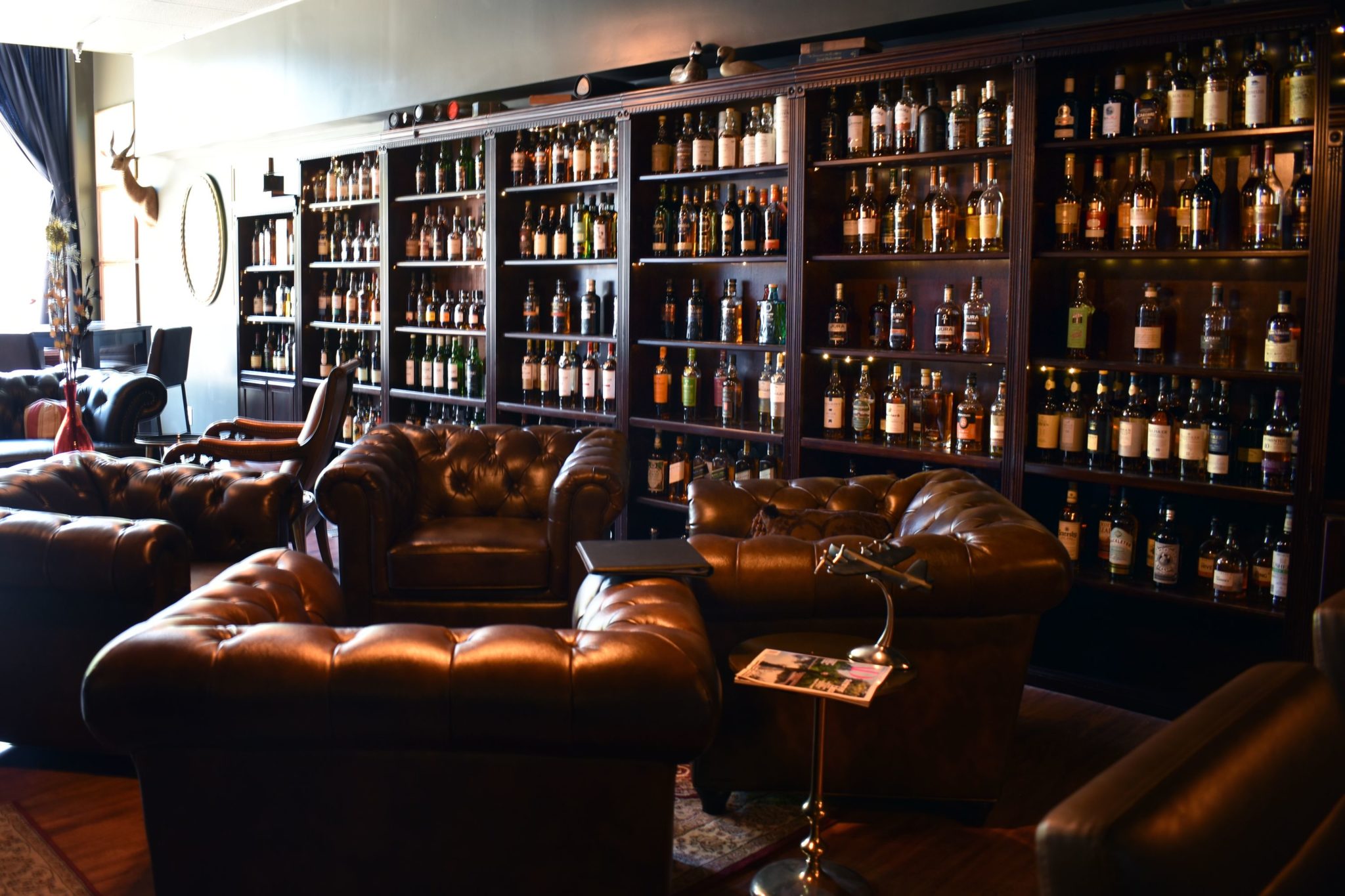 Indulge in the cozy ambiance of the Anthology Whiskey Room, a must-visit spot in Downtown Warsaw.